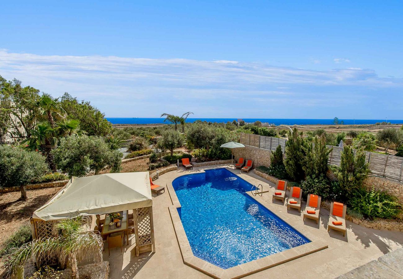 large swimming pool and views at gozo holiday villa