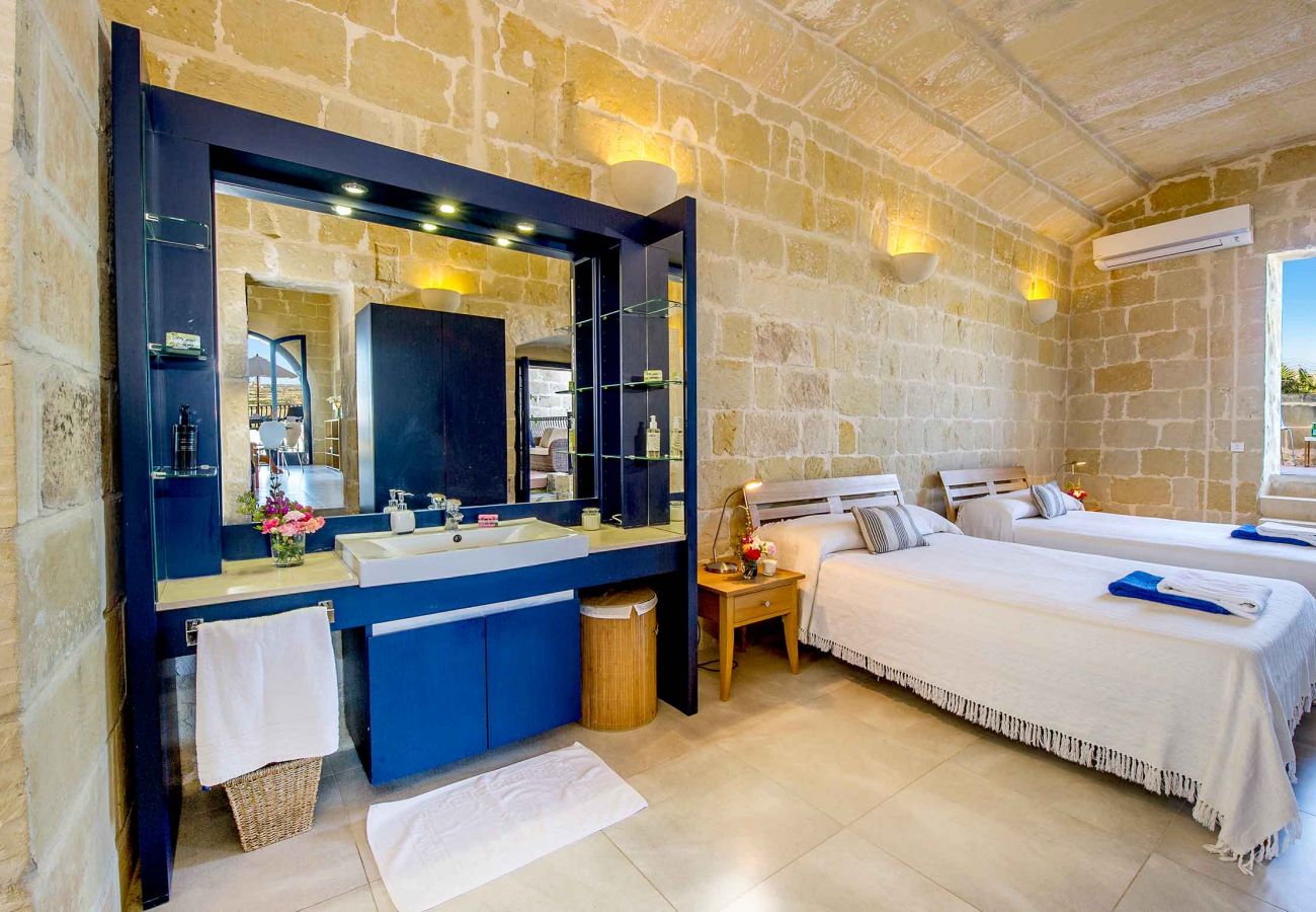 bedroom of luxury villa gozo