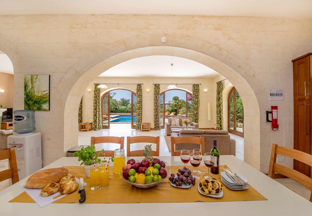 dining room of gozo farmhouse with pool
