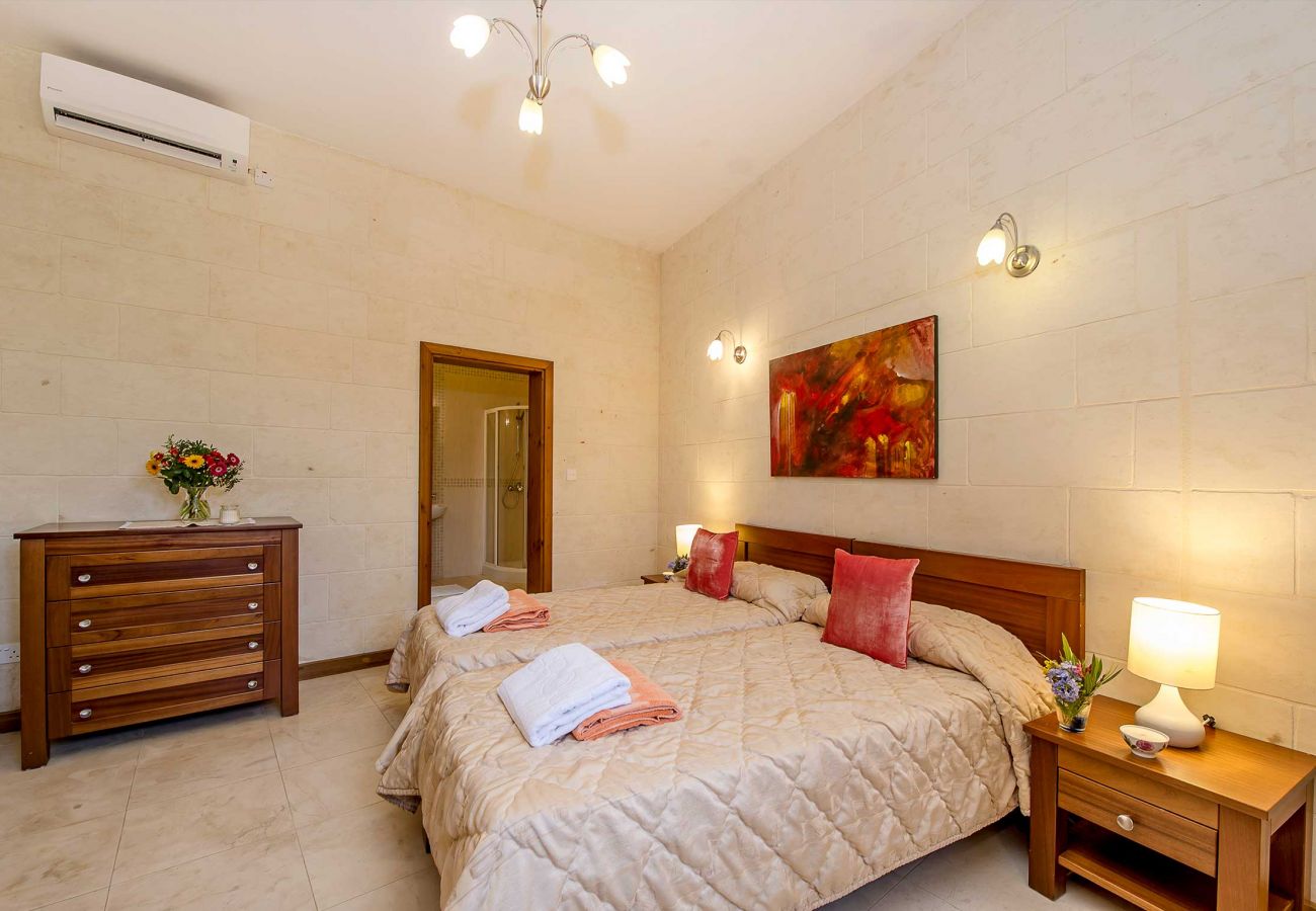 bedroom of gozo rentals farmhouse